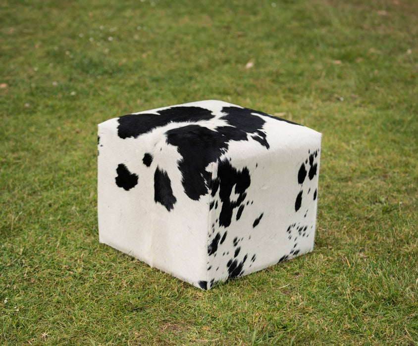 Black and white cowhide cube stool