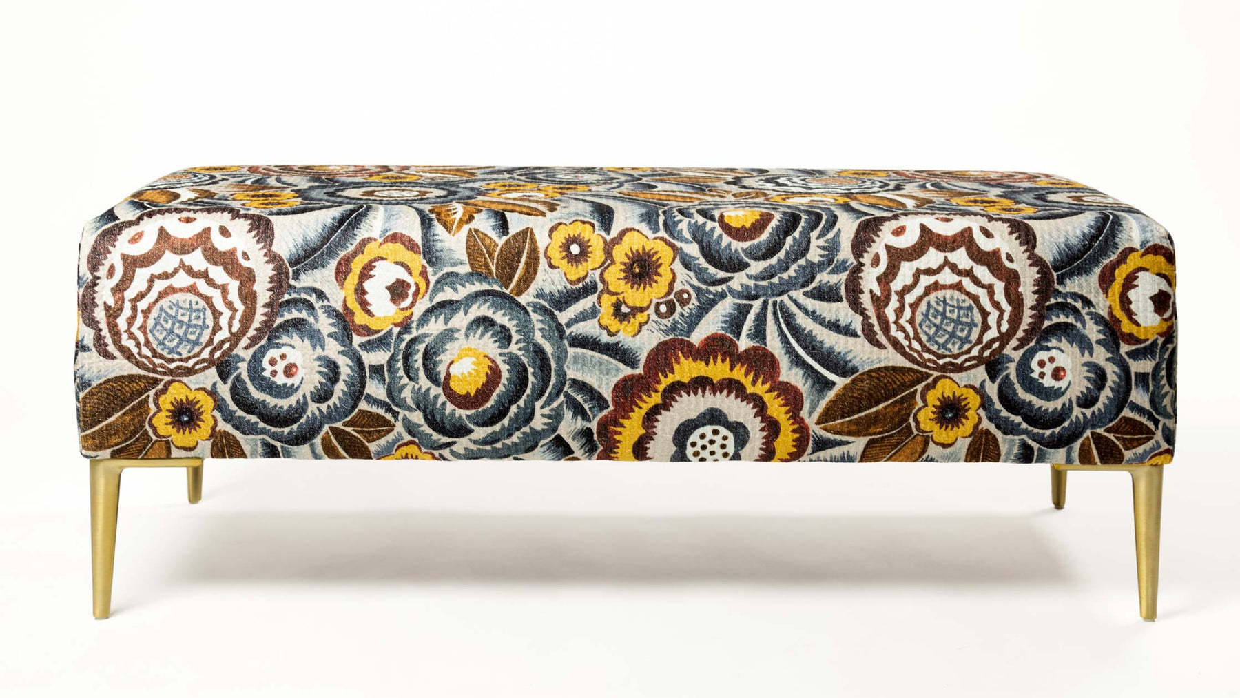 Floral fabric ottoman with gold legs