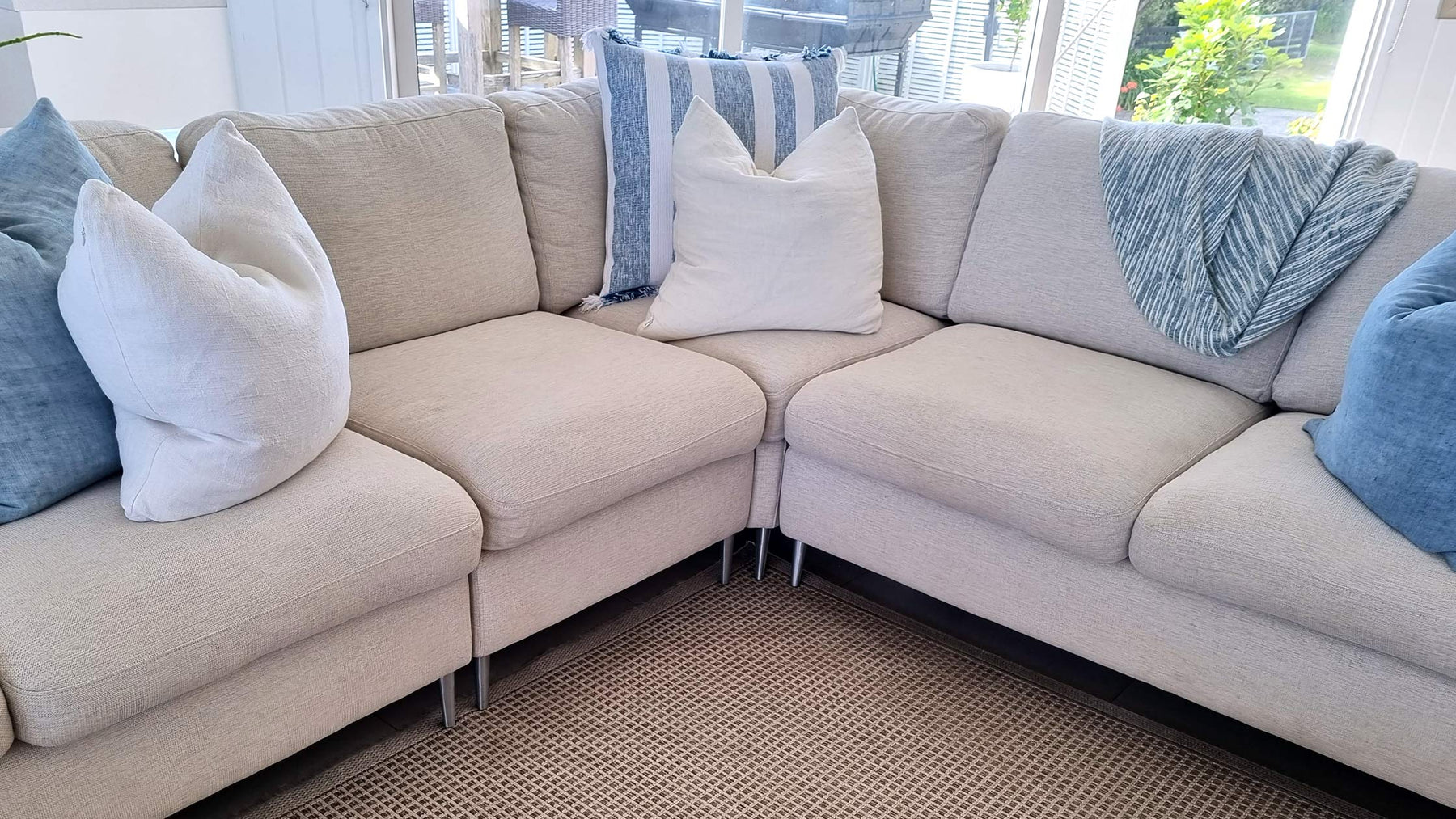 Raising the height of a sofa with new furniture legs