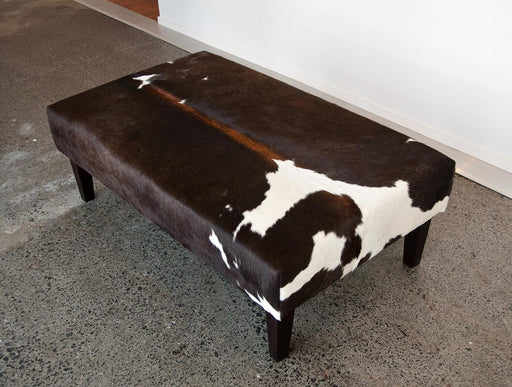Chocolate brown and white cowhide ottoman by Gorgeous Creatures