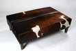 NZ cowhide ottoman copper studs