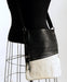 Pale grey cowhide shoulder bag open