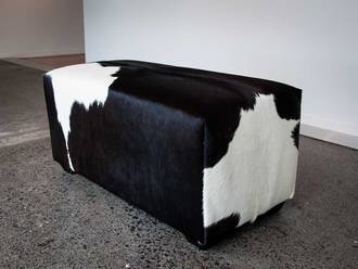 Black and white cow skin ottoman small deep rectangle